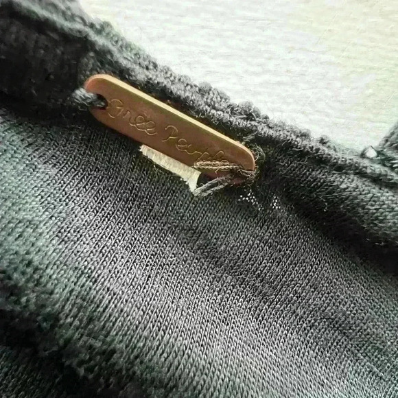 Free people black dress with cutout on the side and in the back. Size is XS/S. - Picture 8 of 12